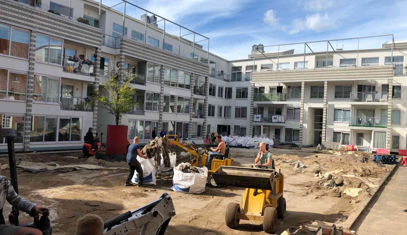 Aanbrengen zandbed en split Rode Weeshuisstraat Groningen